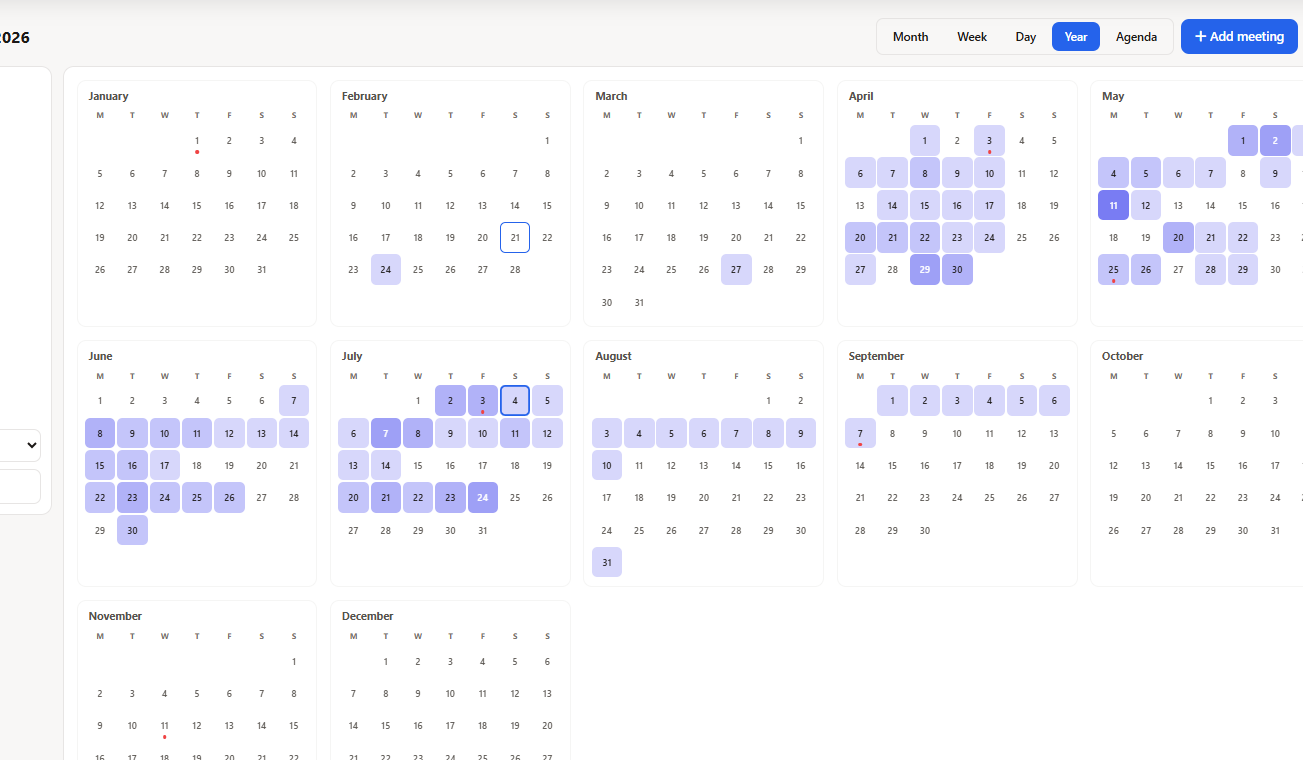 Year heatmap view of a field service team calendar showing per-day staff density for time-off approval